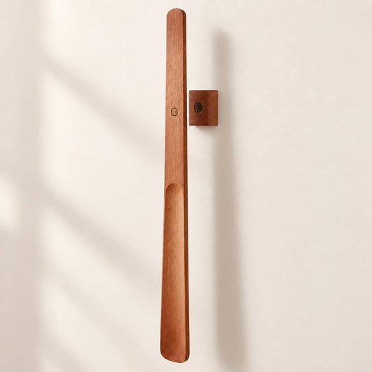 Brown wooden magnetic shoehorn with matching wall mount